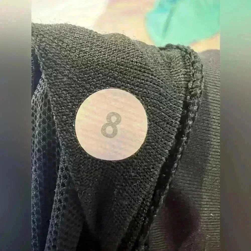 Lululemon Black tank with drape back and crisscross back straps. Size 8